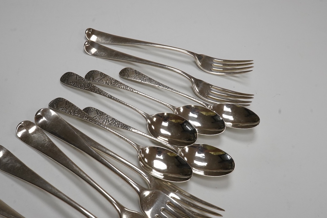 A set of six George III silver Hanoverian pattern dessert forks, Christopher & Thomas Wilkes Barker, London, 1802, together with six 18th century silver base mark dessert spoons and a set of six late Victorian engraved s